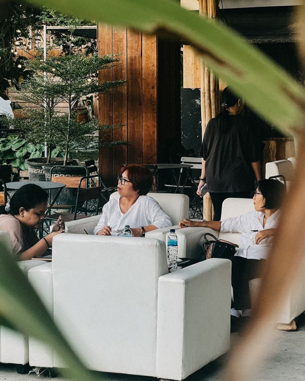 People enjoying coffee at a cafe